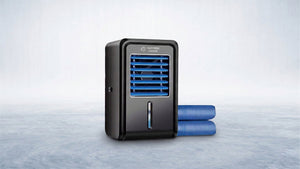 Sleek black mattress cooler with blue vents and cooling tubes, promising refreshing sleep on a cool, modern backdrop.