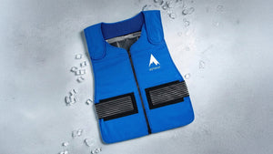 Innovative blue alphacool cooling vest with ice packs, signifying advanced personal heat relief.