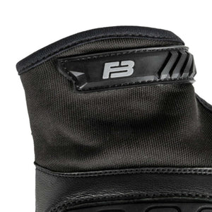 Black warrior glove by 221B Tactical, cropped, with an embossed 'FB' logo patch, ribbed texture, fabric, and leather.
