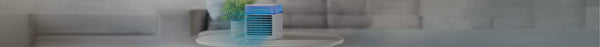 A white portable air cooler with blue lights and 