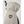 Light gray 3-finger glove by Hestra with an embroidered shield logo, gathered wrist, and black clip.