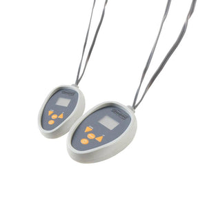 Heated blanket by Beautyrest, presented by two white and gray oval remote controls with orange up/down, sleep, and power buttons, and digital screens.
