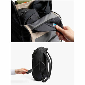 Black Venture Ready Pack by Bellroy showing a hand pulling a cap from the main compartment and a wallet from a side pocket.