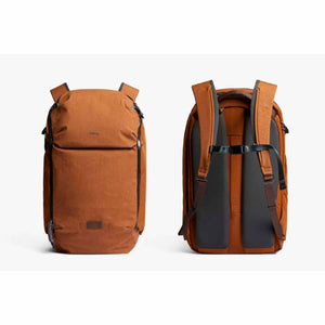 Rust brown fabric backpack by Bellroy, displayed in front and back views with padded shoulder straps.