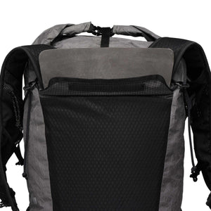 Grey and black backpack by Black Diamond, featuring a large mesh front pocket, roll-top closure, and padded shoulder straps.
