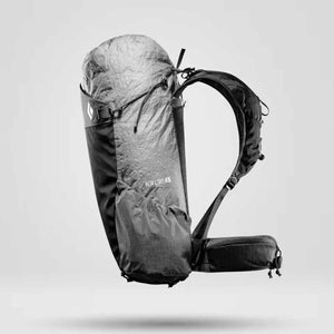 Grey ultralight backpack by Black Diamond, with 'BETA LIGHT 45' text and a small grid pattern on the side pocket, shown floating.
