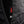 Black backpack by Black Diamond with a 'CHALLENGE SAILCLOTH' label, a 'SIZE M' tag, and textured black fabrics.
