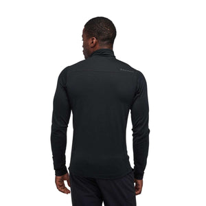 Black quarter zip pullover by Black Diamond with subtle texture and red stitching, shown from the back on a man.