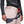 Light beige Women's Alpine Light Pant by Black Diamond, worn with a black, grey, and red climbing harness.