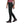 Black women's Alpine Light Pant by Black Diamond, a side view on a person walking, featuring an elastic waistband.