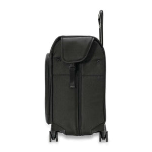 Black Deluxe Wardrobe Spinner by Briggs & Riley, shown from the side with a front flap pocket and extended handle.