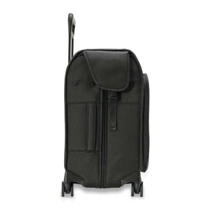 Black Deluxe Wardrobe Spinner by Briggs & Riley, side view with extended handle, front flap pocket, and wheels.