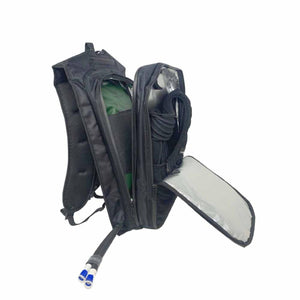 Black dual backpack ice water cooling system by CompCooler, open to reveal a green bladder, coiled black hoses, and two blue connectors.