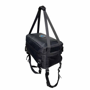 Black textured cooling system bag by CompCooler hanging with top straps, side buckles, and a circular blue logo patch.