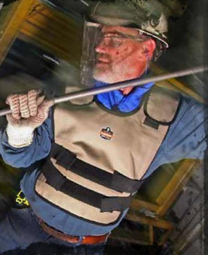 Khaki cooling vest from Chill-Its with black adjustable straps, worn by a man in a work environment.
