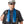 Blue microfiber cooling towel by Chill-Its draped around a construction worker's neck, with light gray reverse side.