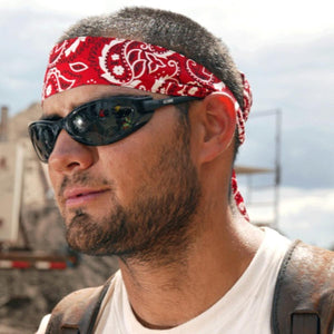 Red paisley bandana by Chill-Its worn on a man's head with black sunglasses.