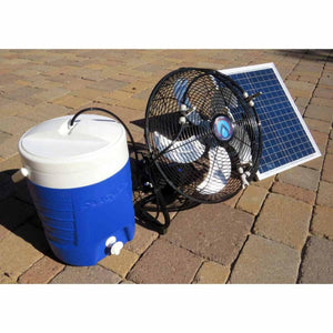 Black portable misting fan by ExtremeMIST with white blades, connected to a blue water tank and solar panel, on outdoor pavers.