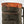 Dark olive robust backpack by FjallRaven, with an orange and black camouflage top flap, brown leather trim, and fox logo patch.