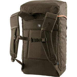 Dark olive robust backpack by FjallRaven, with padded shoulder straps, chest strap, and side lacing system.