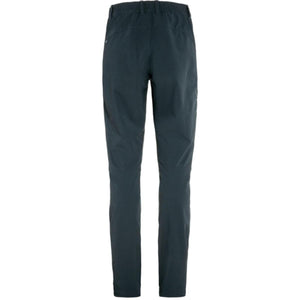 Dark blue women's trail stretch trousers by FjallRaven, shown from the back with an elasticated waistband and knee details.