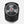 Black Personal Air Circulator by Vornado with a silver fan grill and red logo.