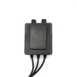 Black rectangular controller clip case by Gerbing with two top knobs and three bottom cords.