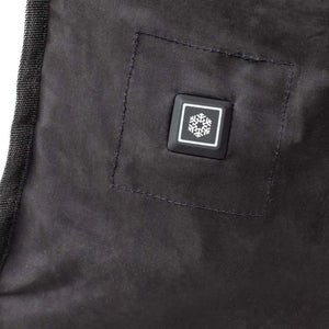 Black dual-zoned cooling camp chair by Gobi Heat, detailed with a square control button displaying a white snowflake.