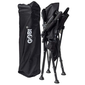 Folded black cooling camp chair by Gobi Heat with a mesh back, cup holder, and matching storage bag.