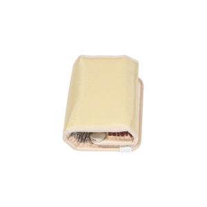 Light beige folded mat by HealthyLine with a colorful patterned lining visible inside.