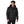 Black hooded men's parka jacket by Helly Hansen, a puffer style with a full zip closure, worn by a man.