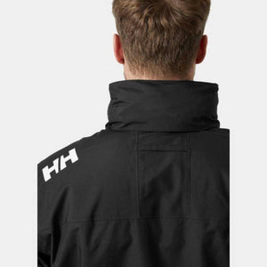 Black men's hooded midlayer jacket by Helly Hansen, shown from the back with a high collar and white HH logo on the shoulder.