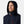 Navy blue hooded men's midlayer jacket by Helly Hansen, shown on a man with hood up, featuring white HH logo and red zipper pulls.