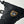 Black 5-finger glove by Hestra, with an embroidered patch showing mountains and 