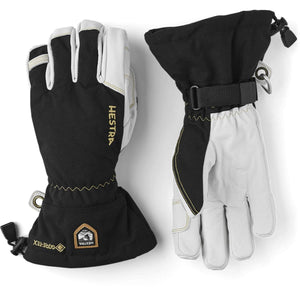 Black and white 5 finger gloves by Hestra, made of leather and fabric, with Gore-Tex and Hestra logos on the adjustable cuffs.