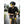 Black and tan short 5-finger gloves by Hestra, worn by a cyclist on handlebars, with 'HESTRA' text visible.