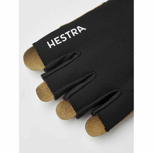 Black fingerless gloves by Hestra with tan suede tips and a white Hestra logo.