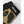 Black and tan short 5-finger gloves by Hestra with textured black palm pads and a white HESTRA logo on the wrist strap.