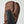 Brown and black 3-finger leather glove by Hestra, featuring a black panel on the palm and thumb.