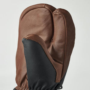 Brown and black 3-finger leather glove by Hestra, featuring a black panel on the palm and thumb.
