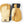 Tan and beige leather 3-finger gloves by Hestra, with a black wrist cuff, embossed logo, and a brand patch.
