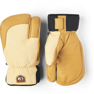 Tan and beige leather 3-finger gloves by Hestra, with a black wrist cuff, embossed logo, and a brand patch.