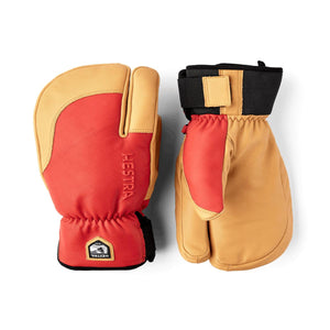 Tan leather and red fabric 3-finger gloves by Hestra, with black accents and adjustable wrist straps.