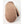 Brown fluffy mitten by Hestra with a ribbed wrist cuff and visible thumb.