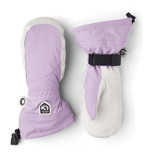 Lavender fabric and off-white leather ski mitts by Hestra, featuring adjustable black wrist straps and a logo patch.