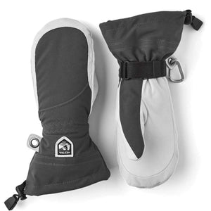 Pair of dark gray and light gray women's ski mitts by Hestra with a logo patch, adjustable straps, and carabiner clip.