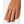 Tan deerskin gloves by Hestra with visible stitching and a supple texture, cropped to show the fingers.
