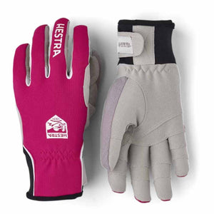 Pair of fuchsia and light grey ski gloves by Hestra, with 'HESTRA' branding, a 'GORE-TEX INFINIUM' label, and black wrist cuffs.