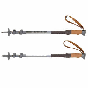 Dark Shadow/Vapor/Canyon Brown trekking poles by Kelty, featuring cork handles and brown wrist straps, laid horizontally.
