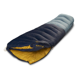 A regular down sleeping bag by Kelty in dark blue and light blue with a gold interior, partially unzipped.